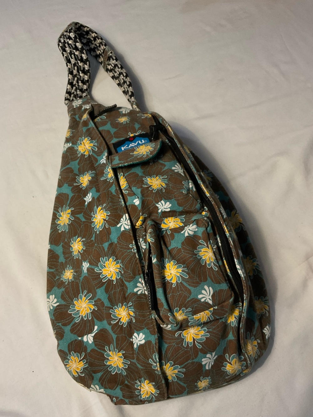 Kavu Brown Floral Crossbody Sling Bag with Yellow & Teal Accents.